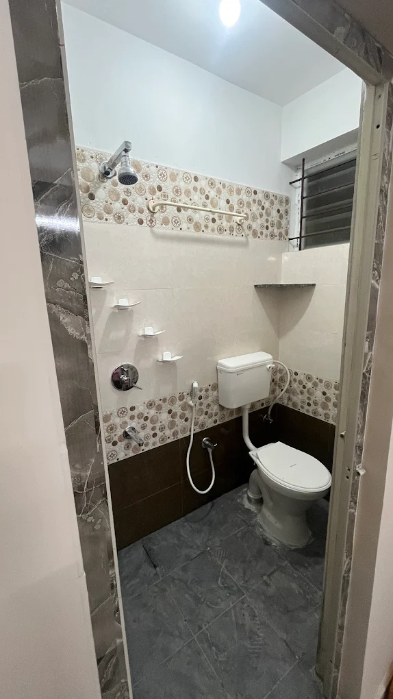 Clean attached bathroom at CK Co-Live PG near Electronic City Bengaluru