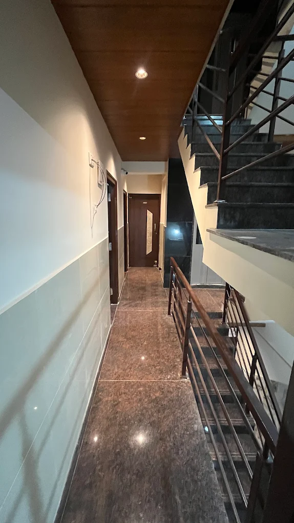 Premium granite corridor at CK Co-Live co-living near AMR Tech Park